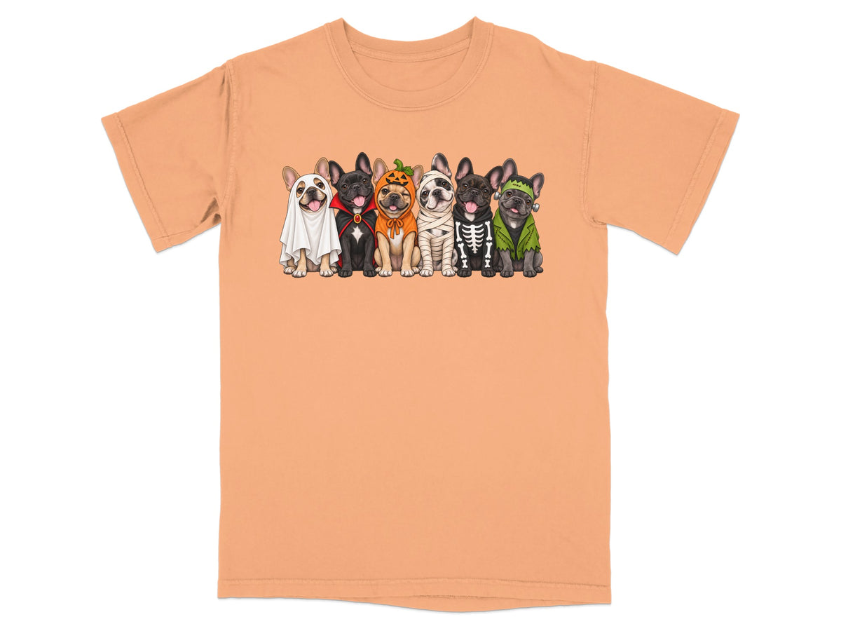 Six French bulldogs in Halloween costumes on an orange t-shirt.