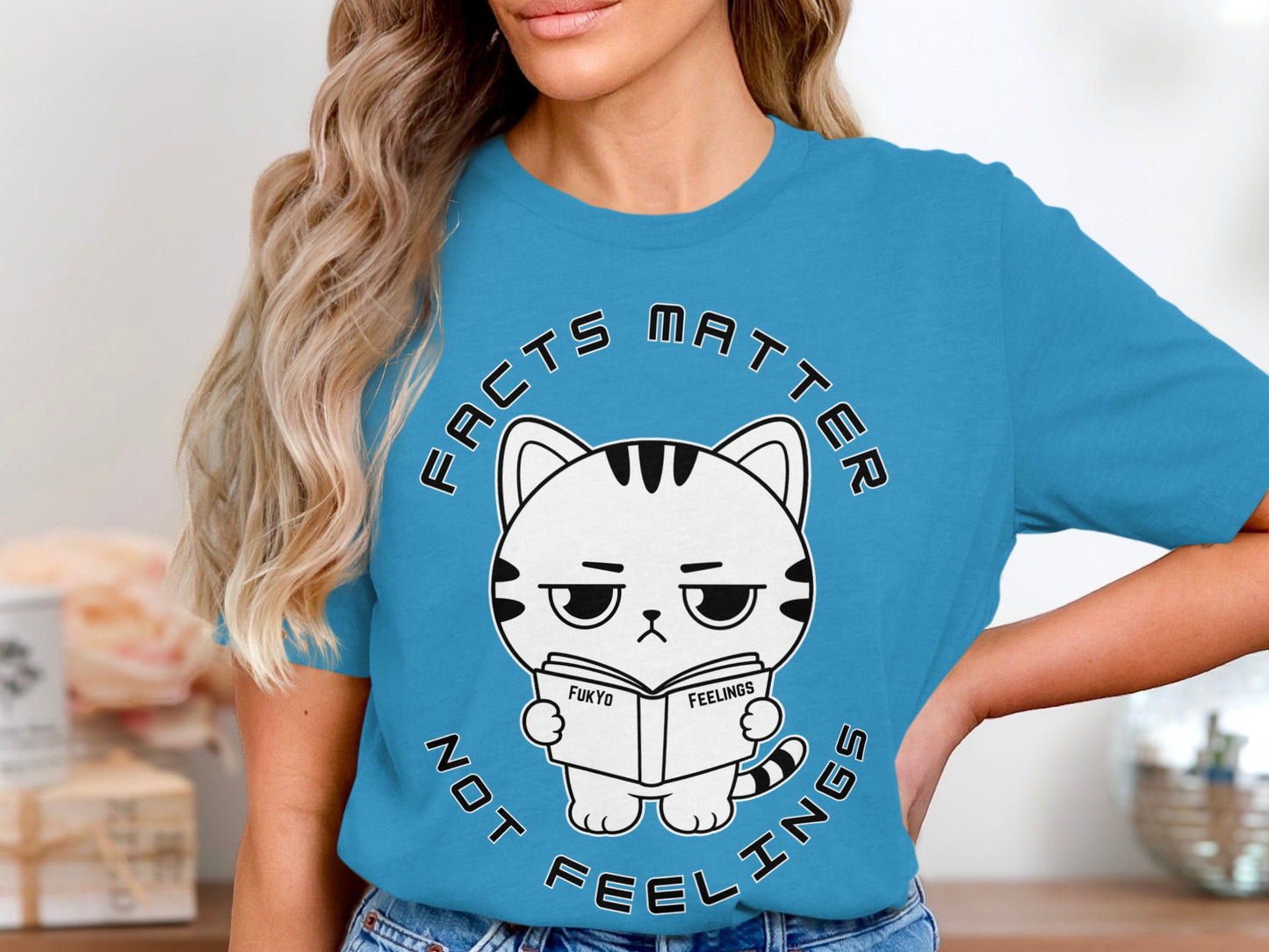 Cat graphic with text "FACTS MATTER NOT FEELINGS" reading a book.