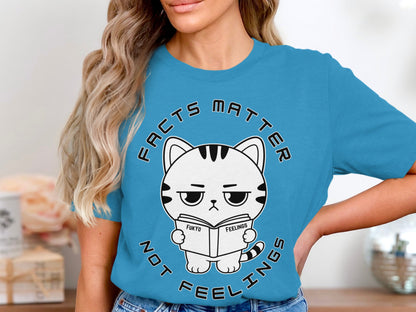 Cat graphic with text "FACTS MATTER NOT FEELINGS" reading a book.