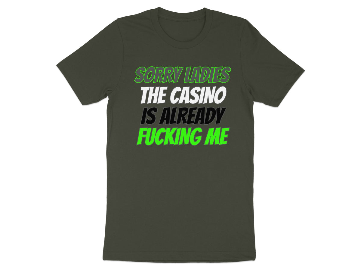 Dark grey t-shirt with text: Sorry Ladies The Casino Is Already Fucking Me.