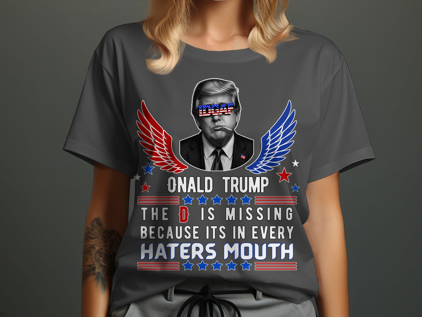Donald Trump shirt with wings and text: "The D is missing because it's in every haters mouth".