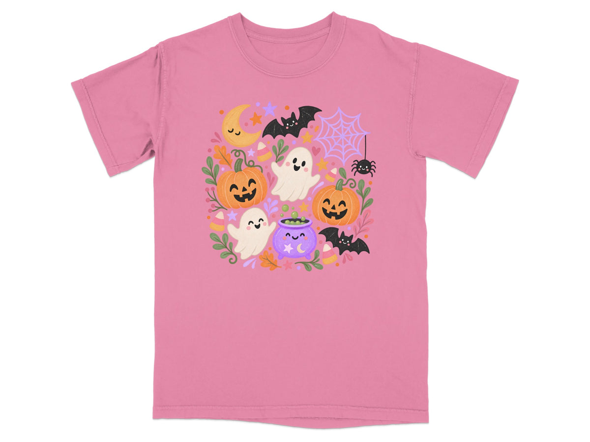 Pink t-shirt with a Halloween graphic featuring pumpkins, ghosts, bats, and a cauldron.