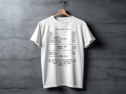 White t-shirt with text: "JESUS PAID IT ALL", receipt list, and Romans 6:23.