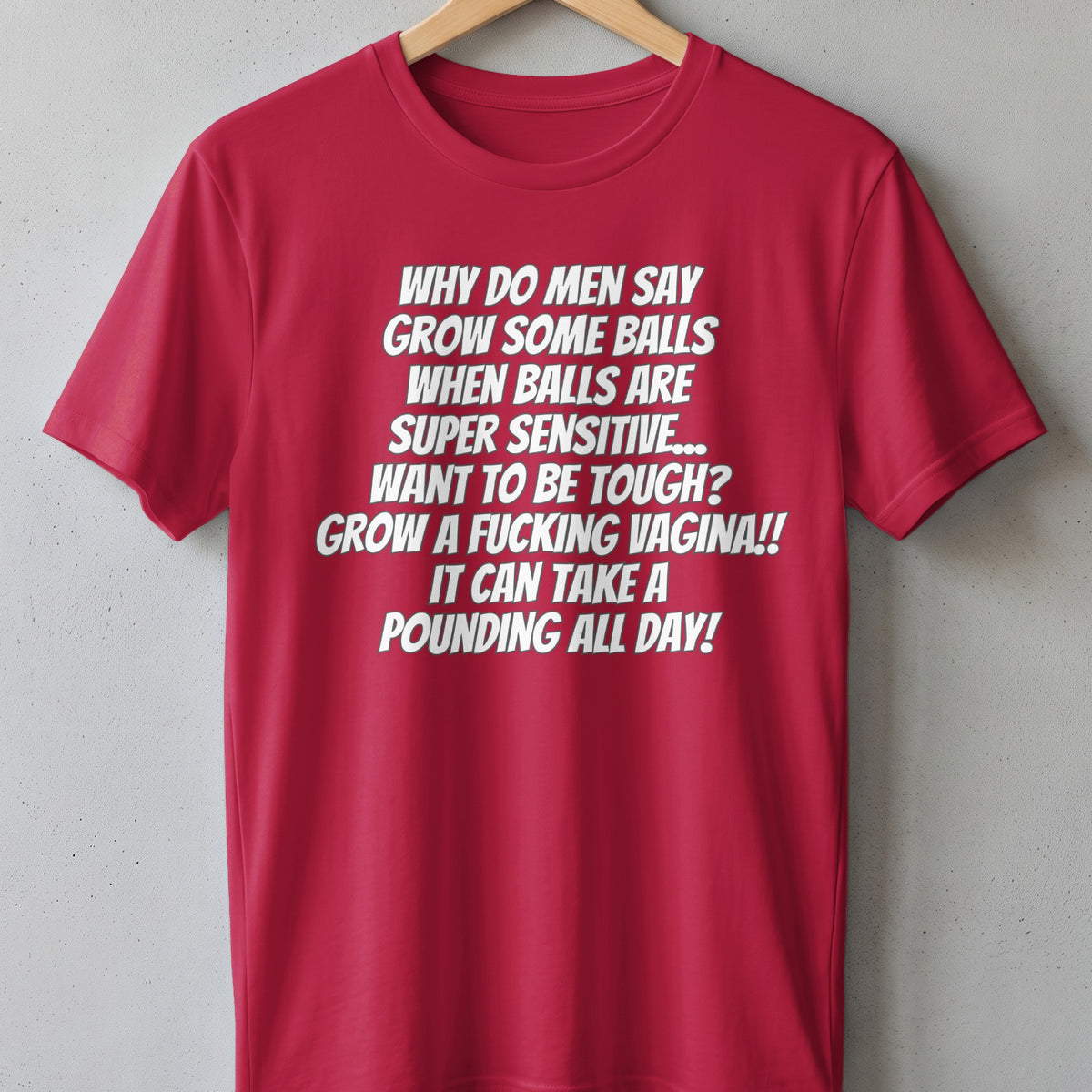 Red t-shirt with white text "Why do men say grow some balls when balls are super sensitive...".