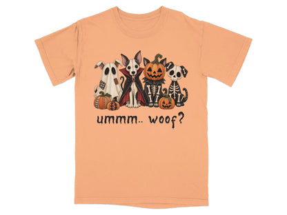 Orange t-shirt with Halloween dogs dressed as a ghost, vampire, skeleton, and pumpkin with text "ummm.. woof?".