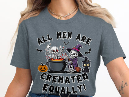 Halloween t-shirt with skeletons, pumpkin, cat, and text "All Men Are Cremated Equally".