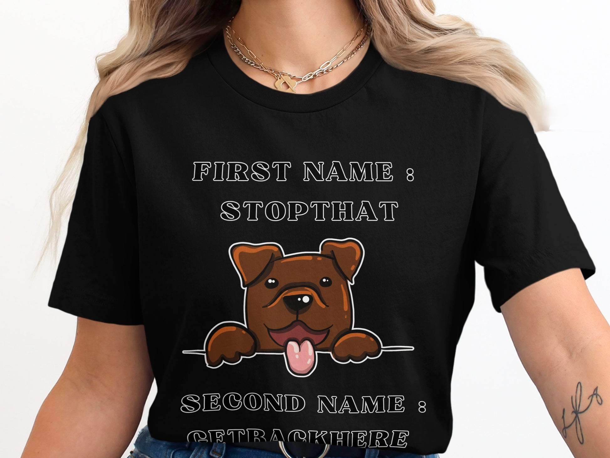 Black t-shirt with cartoon dog and text: First name: STOPTHAT, Second name: GETTRACKHERE