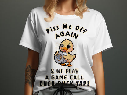 White t-shirt with text and a duck holding duct tape, saying "Piss Me Off Again".