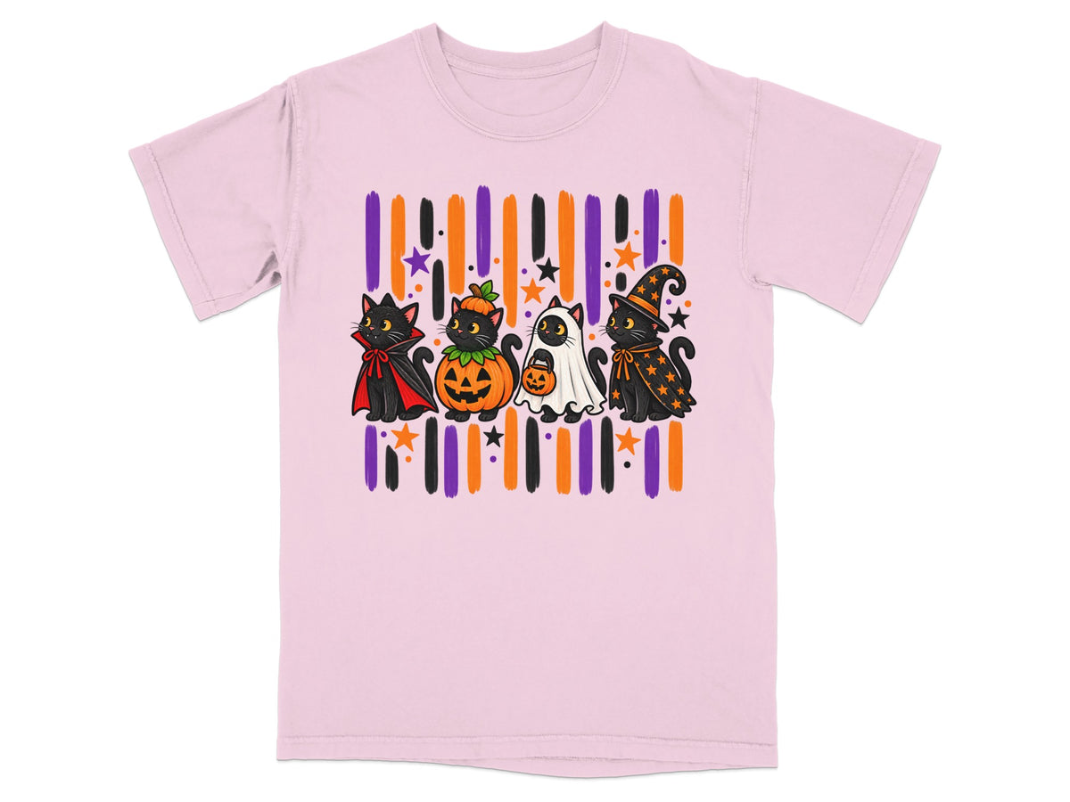 Four black cats in Halloween costumes stand before colorful stripes and stars.