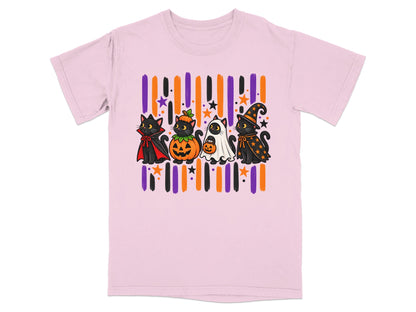 Four black cats in Halloween costumes stand before colorful stripes and stars.