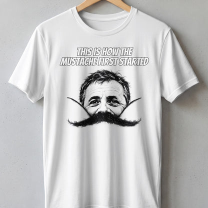 White t-shirt with black and white graphic of a man's face and mustache.