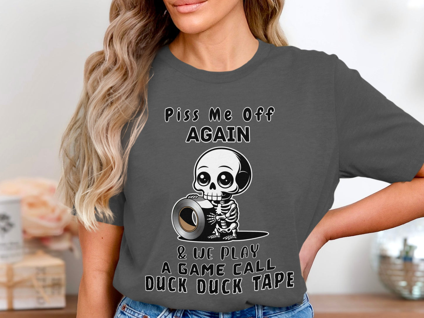 Skeleton holding duct tape with text "Piss Me Off Again & We Play A Game Call Duck Duck Tape".