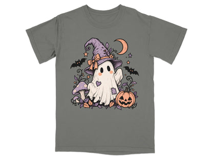 A dark gray t-shirt featuring a cute ghost wearing a witch hat, surrounded by pumpkins, bats, and mushrooms.