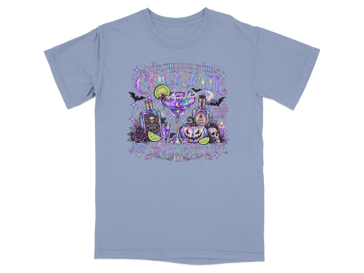 T-shirt with Halloween cocktail graphic featuring "Pour the Boos in the Cocktail" and "And Sip All Night Long".