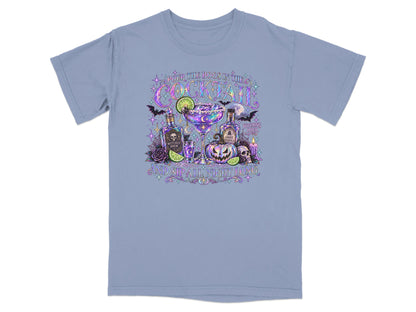 T-shirt with Halloween cocktail graphic featuring "Pour the Boos in the Cocktail" and "And Sip All Night Long".