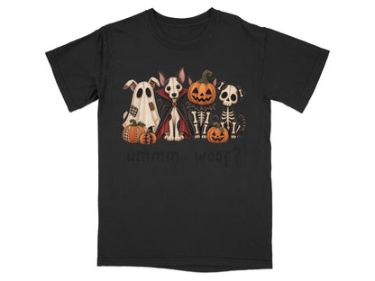 Four Halloween dogs dressed as a ghost, vampire, skeleton, and a pumpkin; text reads "ummm.. woof?".