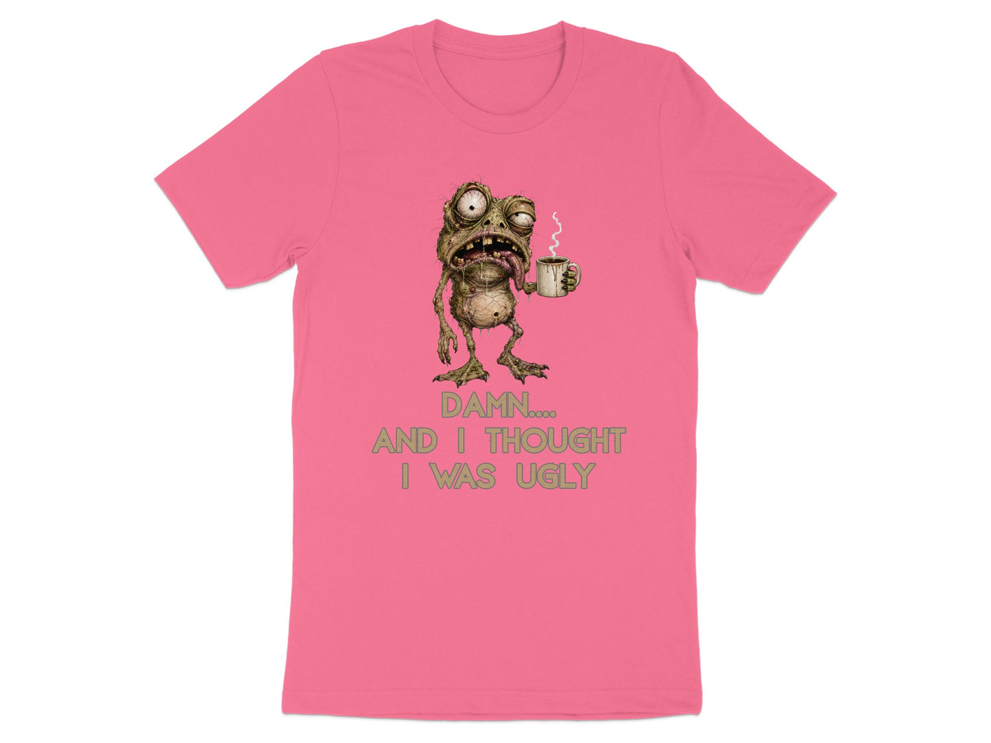 Pink t-shirt with a distressed creature holding coffee and text "Damn, and I thought I was ugly."