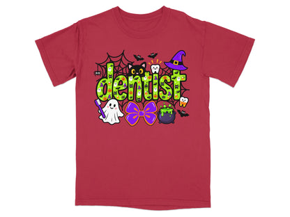 A red crewneck t-shirt featuring a green Halloween-themed graphic that reads dentist.