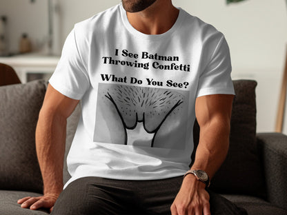 White t-shirt with text "I See Batman Throwing Confetti What Do You See?" and an illustration of a pubic area.