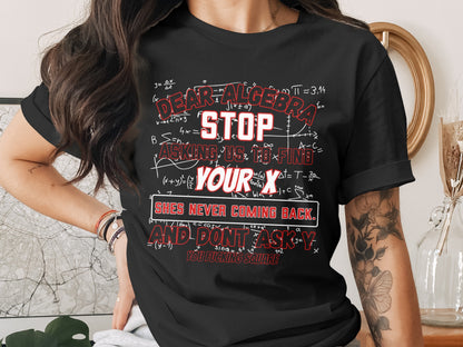 Black t-shirt with math equations and text: "Dear algebra stop asking us to find your x".