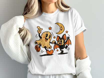 Ghost and bat characters dancing with a smiling moon and stars graphic.