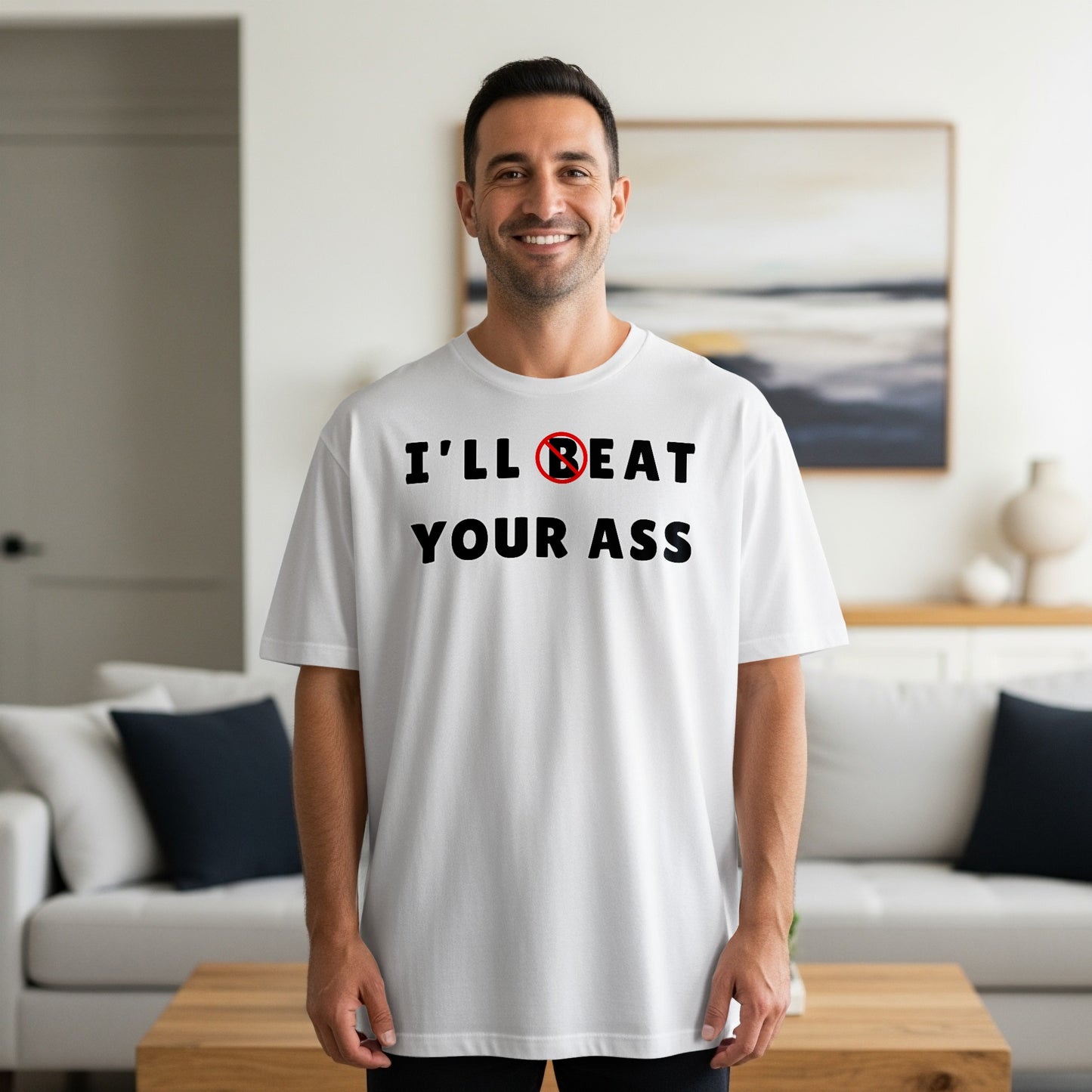 Man wearing white t-shirt with text "I'LL BEAT YOUR ASS"