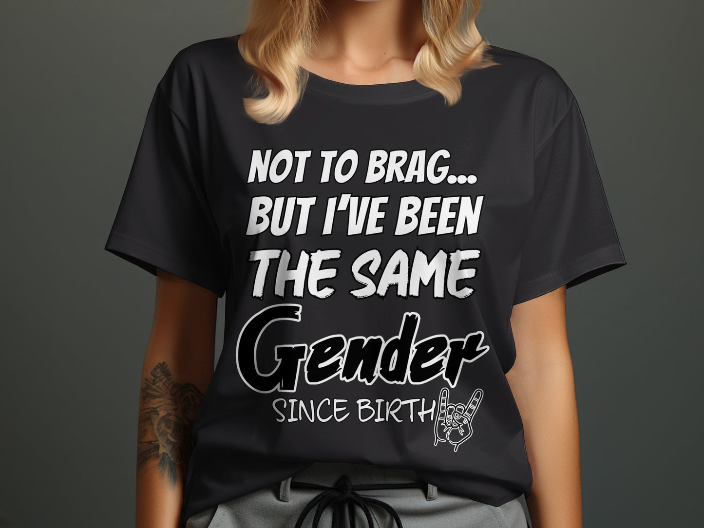 Black t-shirt with "Not to brag but I've been the same gender since birth" text.