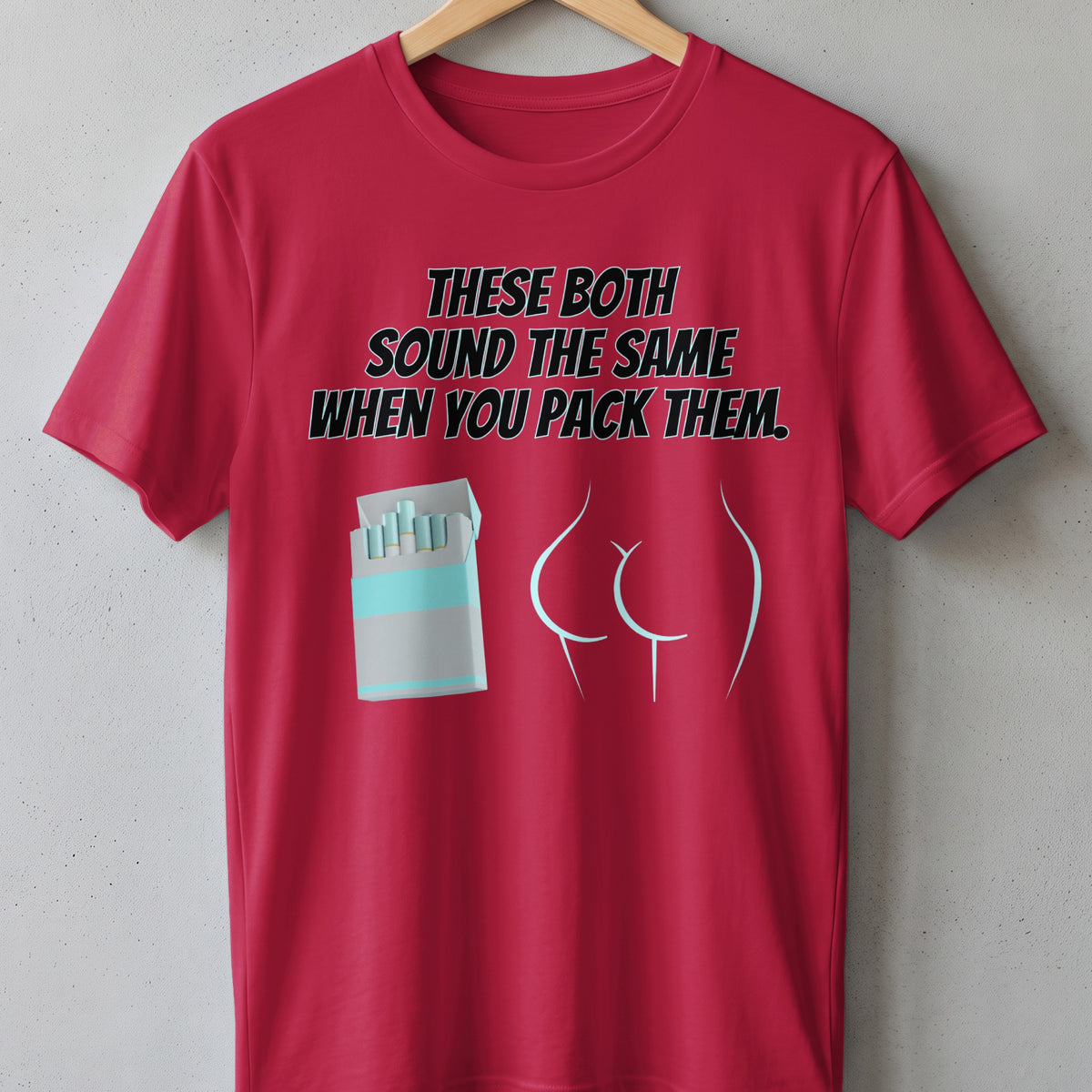 Red t-shirt with text "These both sound the same when you pack them" and cigarette pack.