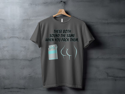 Gray t-shirt with text "THESE BOTH SOUND THE SAME WHEN YOU PACK THEM" and graphics.