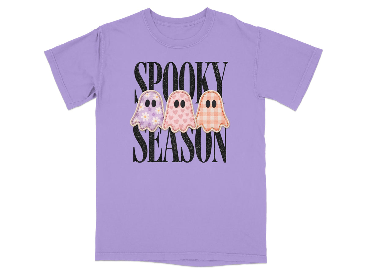 Lavender t-shirt with "Spooky Season" text and three patterned ghost graphics.