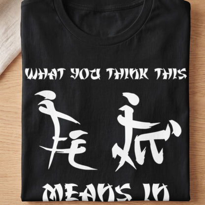 Black t-shirt with white text "WHAT YOU THINK THIS MEANS IN" and two abstract figures.