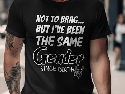 Black t-shirt with "Not to brag... but I've been the same Gender since birth" text and rock on hand graphic.