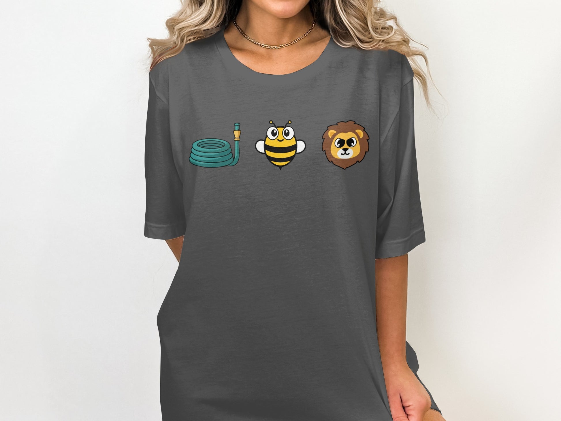 Dark grey t-shirt with a coiled hose, bee, and lion cartoon graphic.