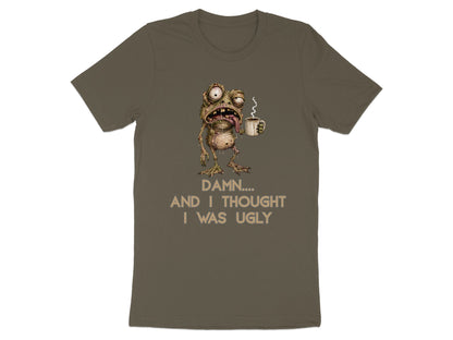 T-shirt with a grotesque creature holding a coffee cup and the text "DAMN.... AND I THOUGHT I WAS UGLY".