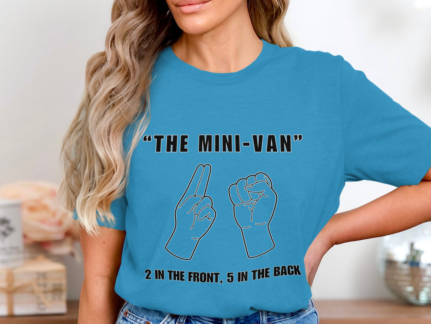 Blue t-shirt with "The Mini-Van" and hand gesture illustration.