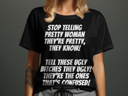 Black t-shirt with white text: "STOP TELLING PRETTY WOMAN THEY'RE PRETTY, THEY KNOW!"
