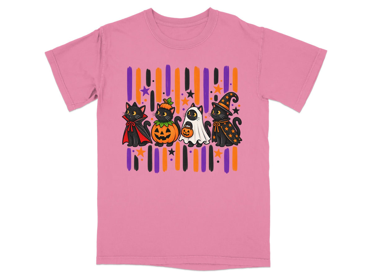 Four cartoon cats in Halloween costumes: vampire, pumpkin, ghost, and witch, on pink shirt.