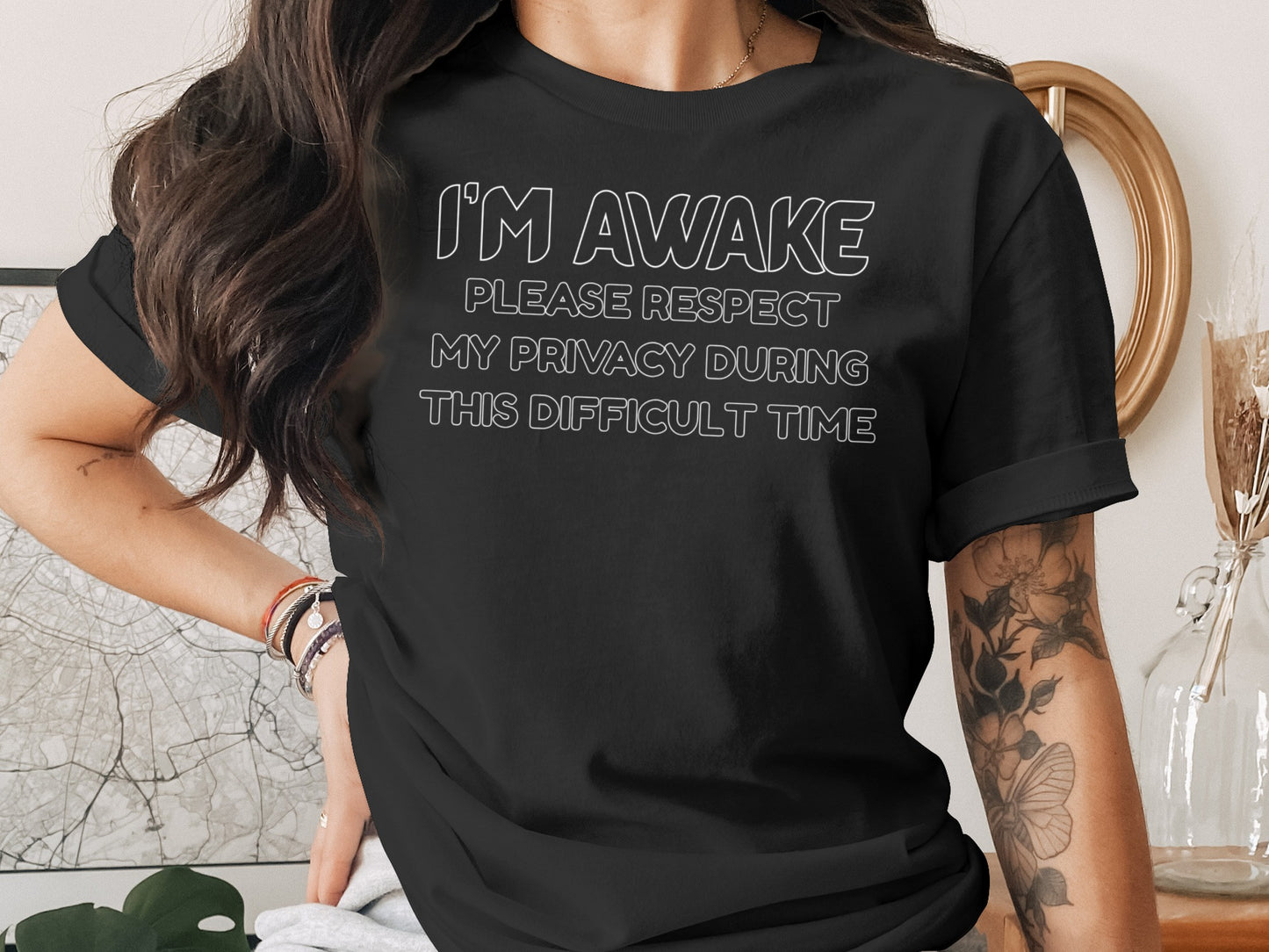 Black t-shirt with white text: "I'M AWAKE PLEASE RESPECT MY PRIVACY DURING THIS DIFFICULT TIME"