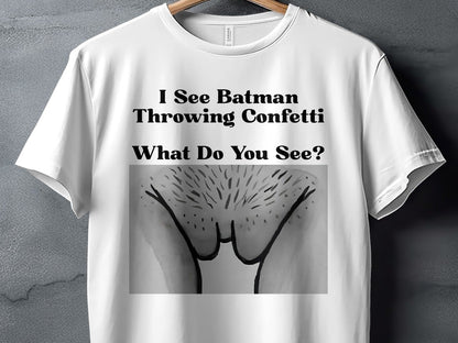 White t-shirt with text "I See Batman Throwing Confetti What Do You See?" and a graphic.