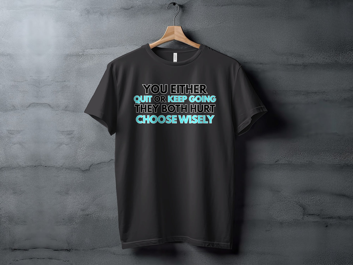 Black t-shirt with text reading "You either quit or keep going, they both hurt. Choose wisely."