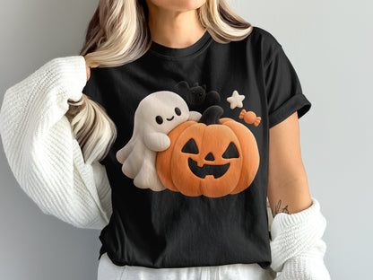 Black t-shirt with a cute ghost, pumpkin, bat, candy, and star Halloween graphic.