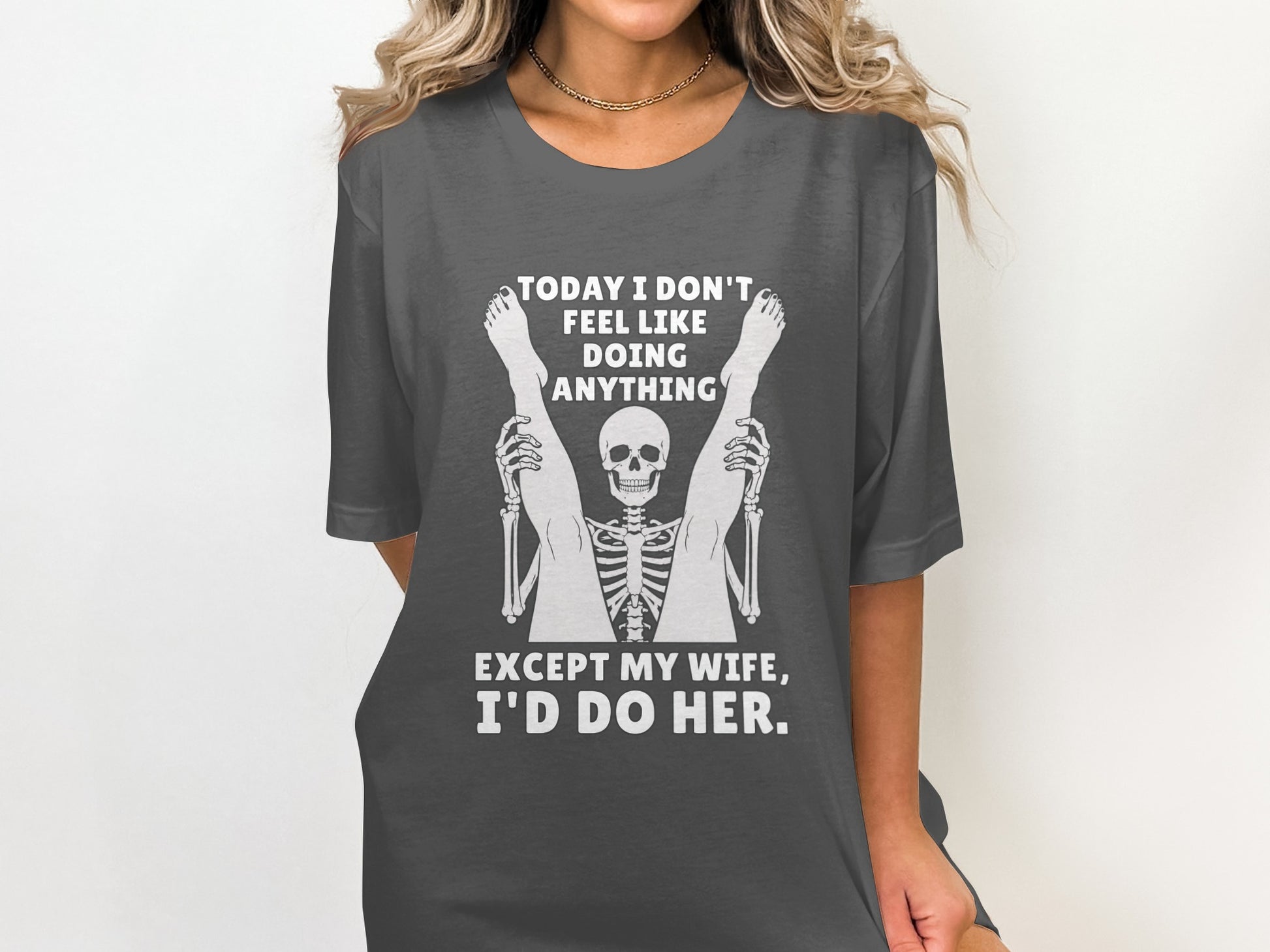 Dark gray t-shirt with white text and skeleton graphic.