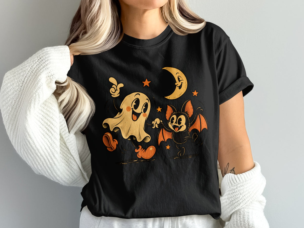 Black t-shirt with vintage ghost and bat characters and a smiling moon.