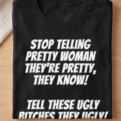 Black t-shirt with white text: "STOP TELLING PRETTY WOMAN THEY'RE PRETTY, THEY KNOW!"
