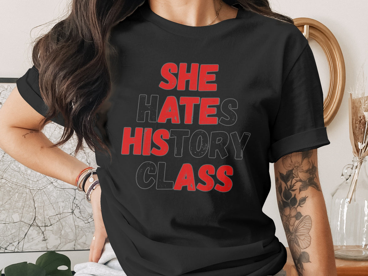 Black t-shirt with red and gray text "SHE HATES HISTORY CLASS".