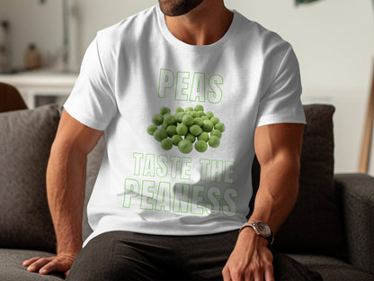 White t-shirt with green text "PEAS TASTE THE PEANESS" and a pile of peas.