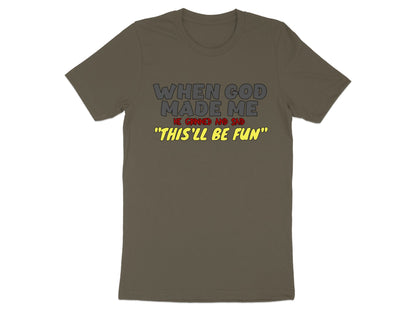 Dark olive t-shirt with text "When God made me, he grinned and said 'This'll be fun'".