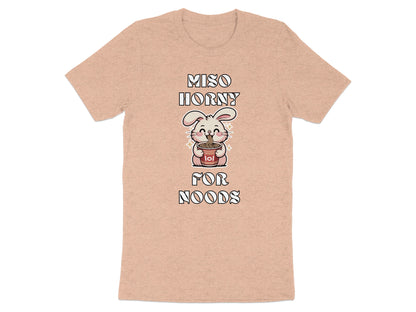Peach t-shirt with "Miso Horny For Noods" text and cartoon bunny holding ramen.