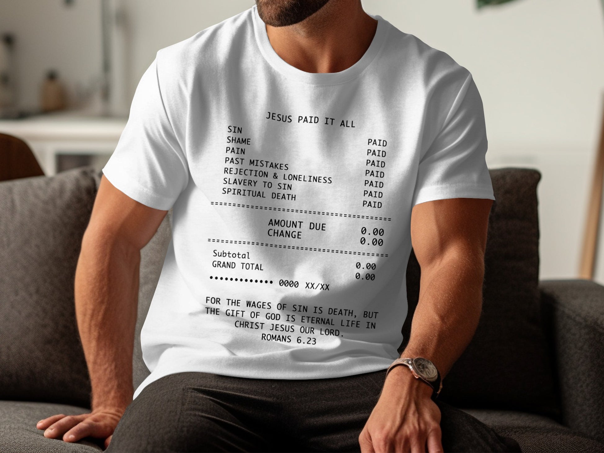 White t-shirt with receipt text: "Jesus Paid It All" listing sins as "Paid".