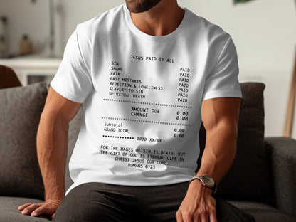 White t-shirt with receipt text: "Jesus Paid It All" listing sins as "Paid".